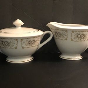 Happy Home Elegance fine China cream and sugar set in good condition